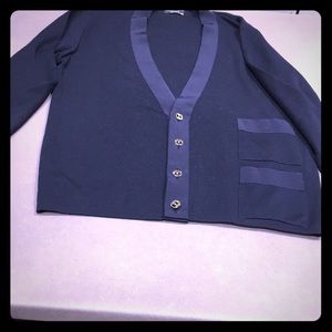 V-neck cardigan sweater pocket detail designer